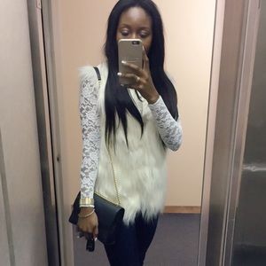 Fairly used blazers and fur vest. Mint condition